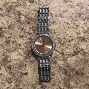 Micheal Kors Women’s watch in silver and rose gold